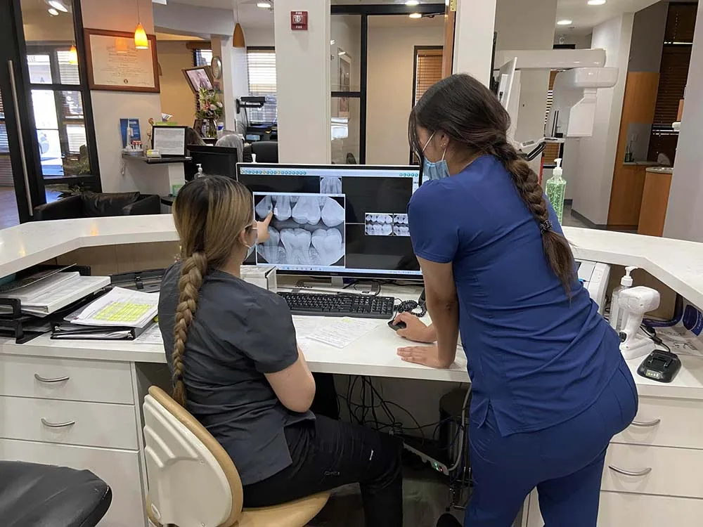 Dental team delivering comprehensive dental care at Desert Lake Family Dentistry